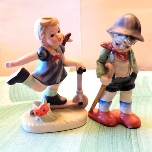 Vintage pair of Hummel type boy & girl